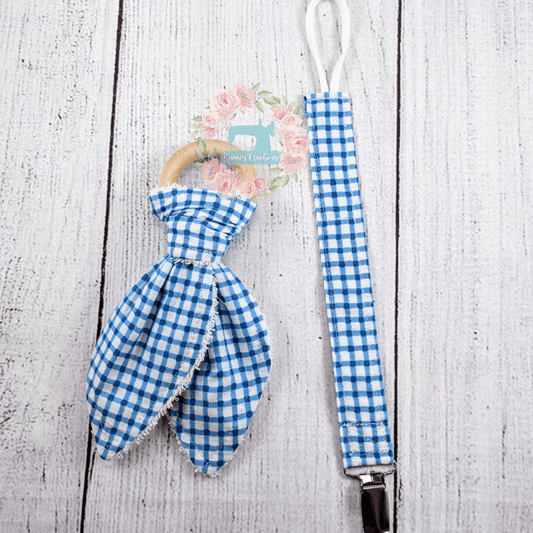 Blue plaid crinkle bunny ear teether and pacifier clip